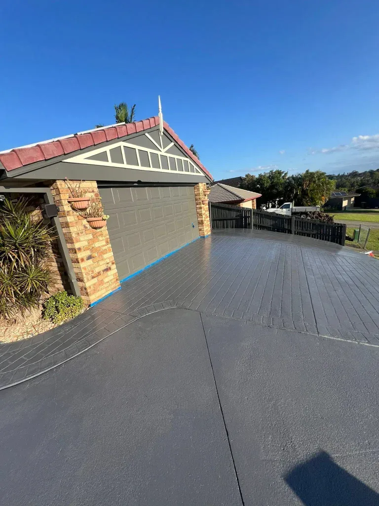 Grey painted driveway after driveway painting in Brisbane